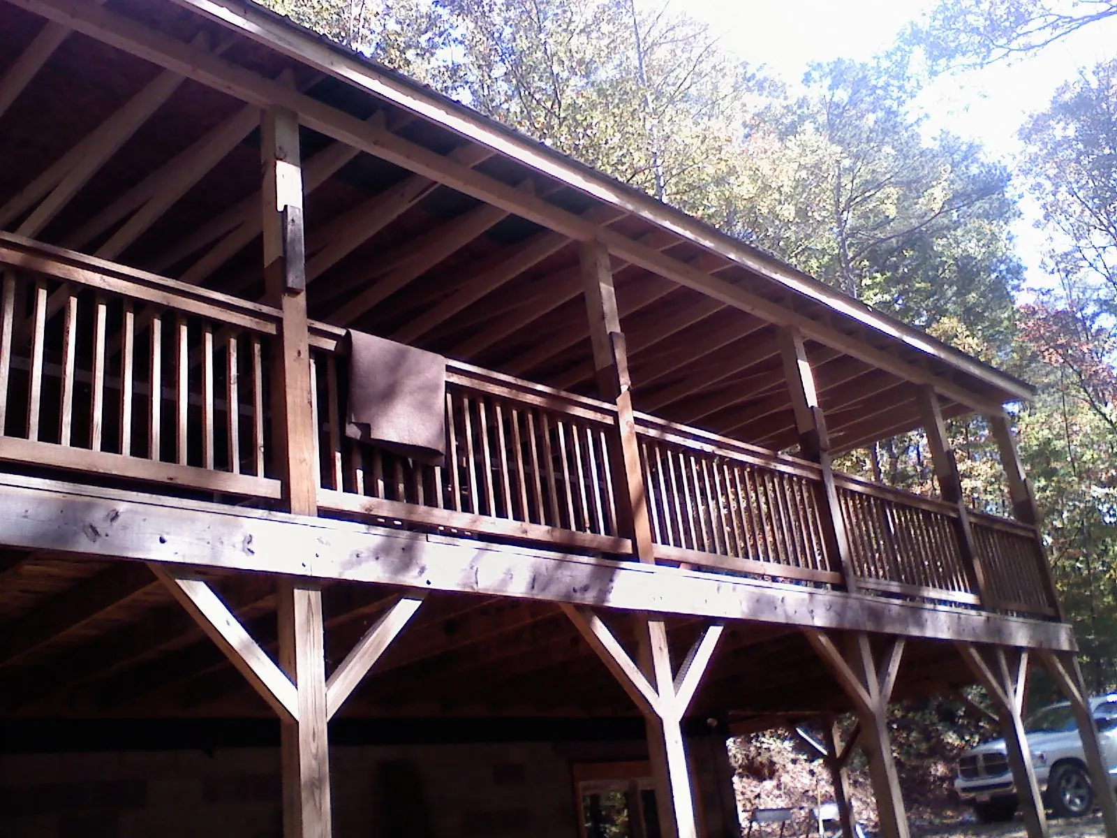 Timber framing under a new elevated porch and deck — Roof Leak Repair in Newbern by Roofing Brothers